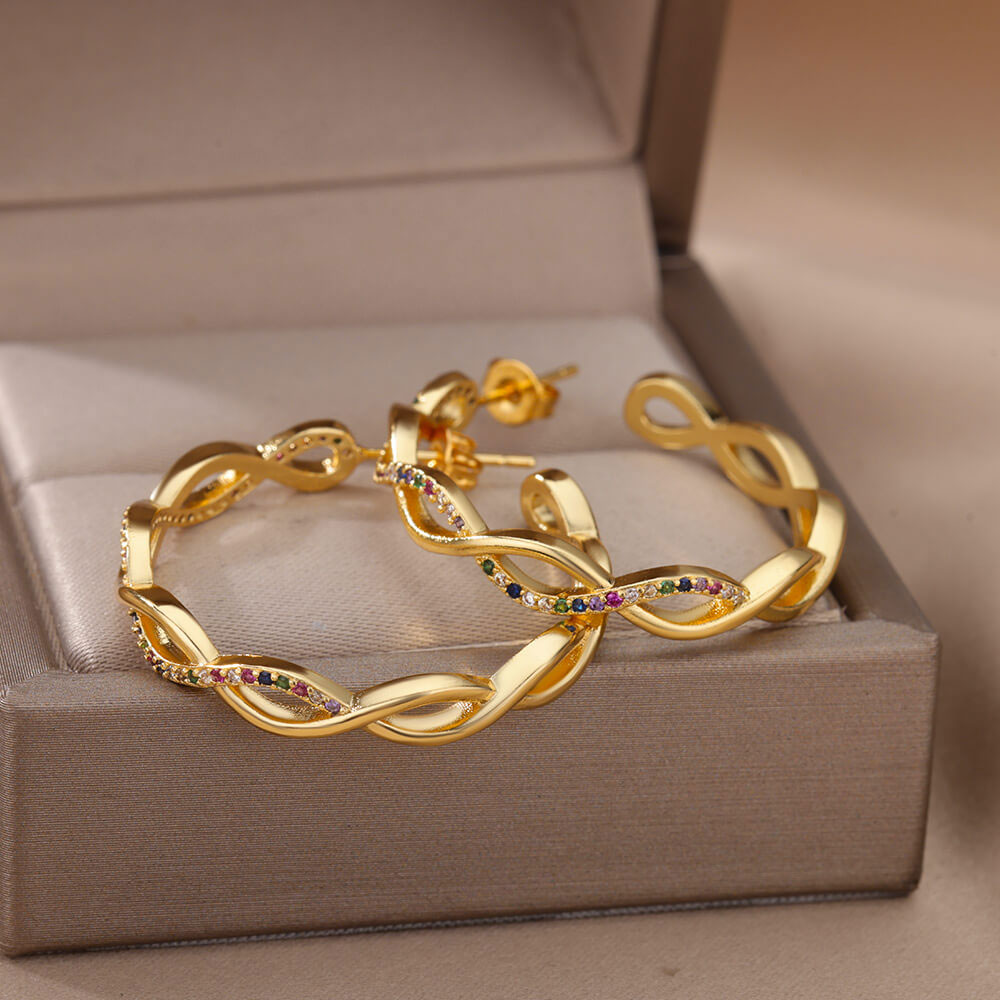 Julenyssa | Brincos Wave em Ouro 18K