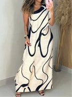 Vestido maxi off-shoulder com padrão abstrato